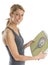 Portrait Of Happy Woman Holding Weight Scale