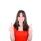 Portrait of happy woman with thumbs up against white background