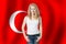 Portrait of happy woman on Turkish flag background. Travel in Turkey