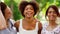 Portrait of happy women or friends at summer park