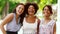 Portrait of happy women or friends at summer park