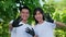 Portrait of happy young Asian students volunteers for cleaning park, forest and woods for healthy environment. Earth day, nature