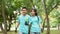 Portrait of happy young Asian students volunteers for cleaning park, forest and woods for healthy environment. Earth day, nature