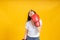Portrait happy young asian woman with boxing glove  self business knock out