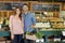 Portrait of a happy young couple in vegetable market