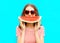 portrait happy young woman is holding slice of watermelon