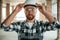 Portrait, in hard hat. Construction worker in uniform in empty unfinished room