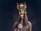 Portrait of haughty Egyptian queen in an ancient pharaoh costume.