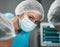 Portrait, healthcare and a woman surgeon in an operation at the hospital for emergency care closeup. Medical, face and