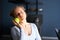 Portrait of healthy lovely young caucasian calm woman with natural makeup touching her face with green apple closed eyes