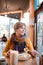 Portrait of healthy older woman eating at  restaurant