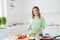 Portrait of her she nice attractive lovely confident cheerful cheery wavy-haired girl making homemade tasty yummy lunch