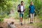 Portrait of hiker couple standing with hiking pole