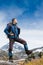 Portrait of hiker looking at the horizon in the mountains