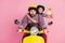 Portrait of his he her she nice attractive worried amazed couple driving moped hurry-up rush holding in hands clock pout