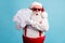 Portrait of his he nice attractive amazed wondered overwhelmed thick white-haired Santa holding in hand many mail gift