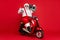 Portrait of his he nice fat cheerful funky Santa hipster wearing cap hat headwear riding motor bike carrying boombox