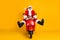 Portrait of his he nice funny amazed stunned childish comic crazy Santa riding moped having fun fooling fast speed sale