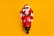 Portrait of his he nice funny fat focused serious Santa St Nicholas driving motor bike traveling highway wintertime