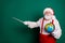 Portrait of his he nice handsome cheerful confident bearded clever smart fat Santa tutor holding in hands globe showing