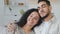 Portrait Hispanic married couple young ethnic Spanish spouses curly beautiful woman girlfriend wife and bearded handsome
