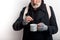 Portrait of homeless beggar with cup for money