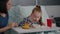 Portrait of hospitalized little chid lying in bed in recovery examination room