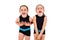 Portrait of identical twin girls dressed in rhythmic gymnastics dress