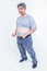 Portrait images of Obese men use a tape measure Fasten his belly fat