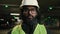 Portrait Indian Arabian bearded man in eyeglasses worker male engineer specialist of manufacture work. Business person