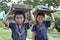 Portrait Indian girls with washboards and laundry