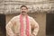 Portrait indian man standing at his house in village