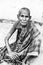 Portrait of an Indian old senior poor very thin woman with saree