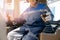 Portrait of industry mechanical worker on port cargo crane