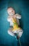 Portrait of infant baby with jackrabbit, easter