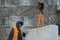 Portrait of installer at unloading ice blocks