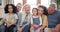 Portrait of interracial family, generations with happiness and love, grandparents with parents and children at home