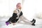 Portrait of Japan anime cosplay woman, white japanese maid in white tone room