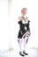 Portrait of Japan anime cosplay woman , white japanese maid in white tone room