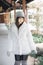 Portrait japanese fasion style wool coat fashion dress in japanese garden