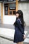 Portrait japanese school girl in downtown ice cream shop