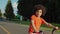 Portrait of joyful preschool child cycling outdoors