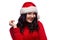 Portrait of joyful woman wearing santa hat in red sweater, smiling broadly being playful and emotive, isolated