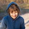 Portrait of a junior girl wearing a knitted hoodie.