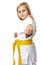 Portrait of a karate girl in kimono with yellow belt ready to fight