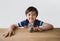 Portrait kid with smiling face after finished counting coins, Child boy counting his saving money, Children learning about saving