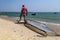 Portrait of Kitesurfer inflate his kite