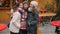 Portrait of Laughing Girlfriends Having Fun on the Christmas Market. Happy Friends Spends Time Together During the