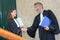 Portrait lawyers shaking hands
