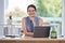 Portrait, leadership and happy woman at her desk for email management, planning schedule and company goals. Vision